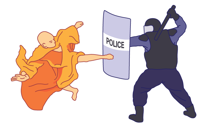 Monk kicking a police officer's riot shield.